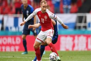 Christian Eriksen dribbling the ball during a UEFA Euro 2020 match for Denmark